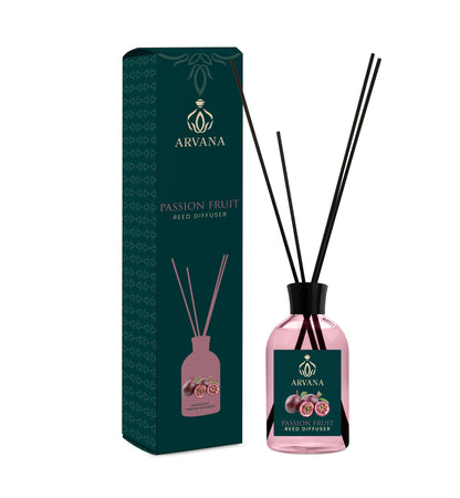 Arvana Passion Fruit Reed Diffuser in a pink glass bottle with black reeds and a dark green box featuring passion fruit illustrations.