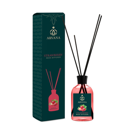 Arvana Strawberry Reed Diffuser in a clear glass bottle with black reeds and a dark green box featuring strawberry illustrations.